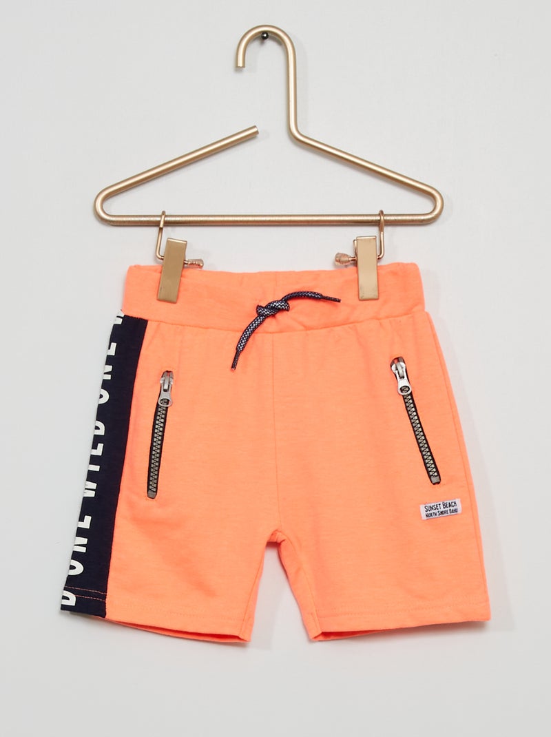 Pantalón corto de felpa con bolsillos con cremallera coral - Kiabi
