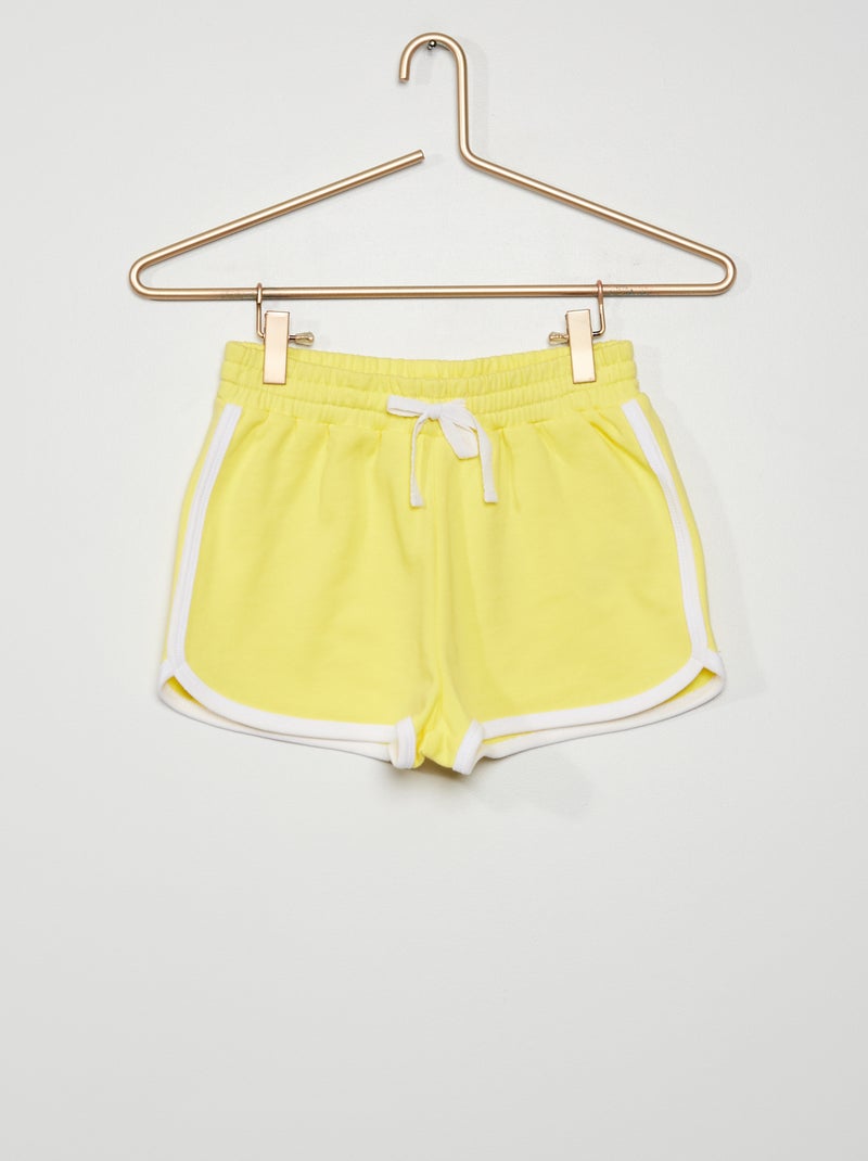 Pantalón corto de felpa con bordes a contraste amarillo - Kiabi