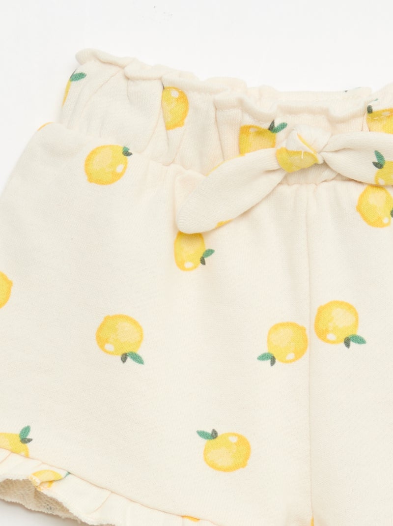 Pantalón corto de felpa ligera con volante Blanco - Kiabi