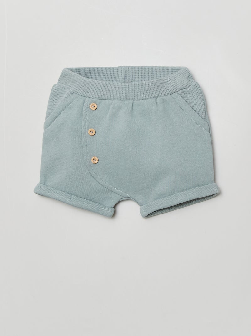 Pantalón corto de felpa ligera y nido de abeja azul - Kiabi