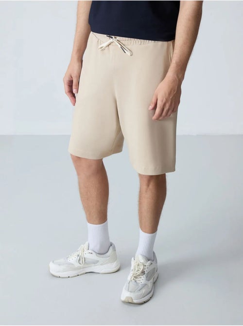 Pantalón corto de felpa para hombre de mezcla de algodón tommy - Kiabi Pantalón corto de felpa para hombre de mezcla de algodón tommy - Kiabi