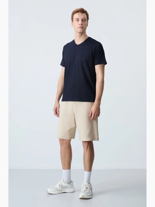 Pantalón corto de felpa para hombre de mezcla de algodón tommy - Kiabi Pantalón corto de felpa para hombre de mezcla de algodón tommy - Kiabi