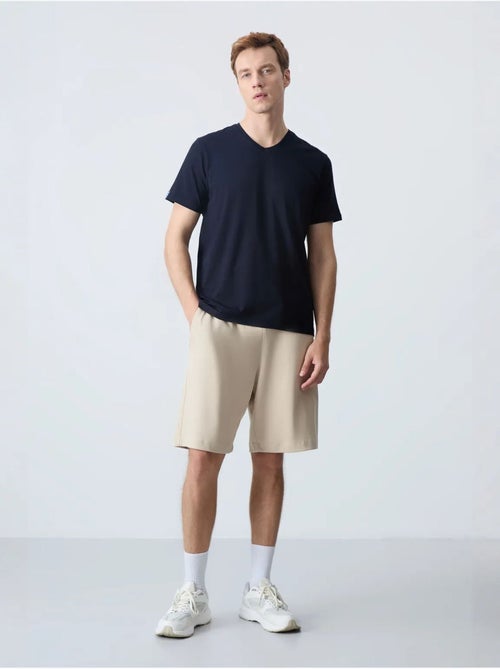 Pantalón corto de felpa para hombre de mezcla de algodón tommy - Kiabi Pantalón corto de felpa para hombre de mezcla de algodón tommy - Kiabi