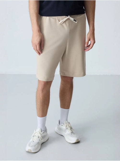 Pantalón corto de felpa para hombre de mezcla de algodón tommy - Kiabi Pantalón corto de felpa para hombre de mezcla de algodón tommy - Kiabi