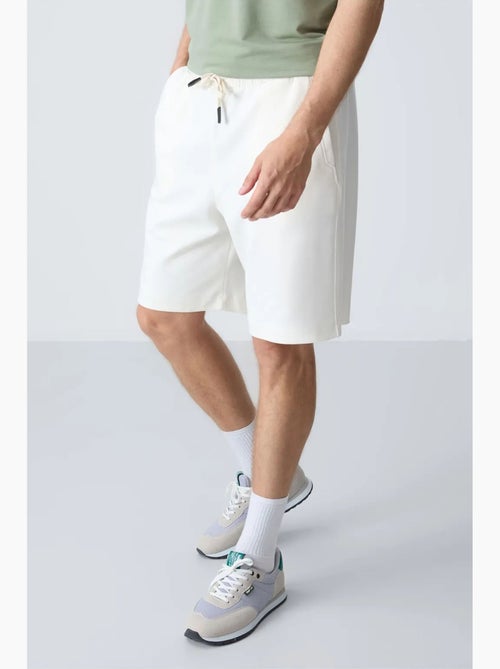 Pantalón corto de felpa para hombre de mezcla de algodón tommy - Kiabi Pantalón corto de felpa para hombre de mezcla de algodón tommy - Kiabi
