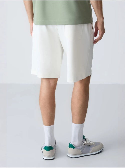 Pantalón corto de felpa para hombre de mezcla de algodón tommy - Kiabi Pantalón corto de felpa para hombre de mezcla de algodón tommy - Kiabi