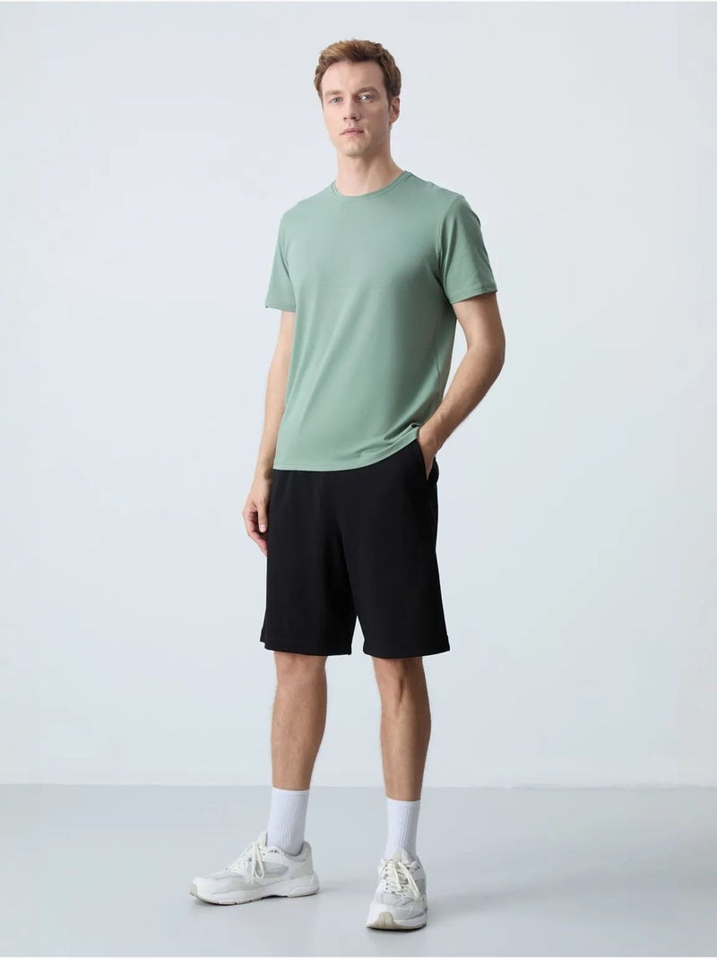 Pantalón corto de felpa para hombre de mezcla de algodón tommy Negro - Kiabi
