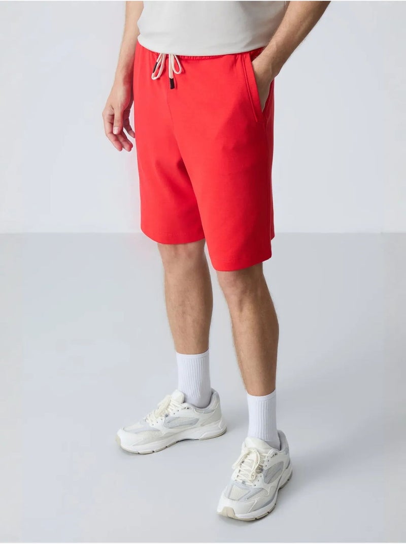 Pantalón corto de felpa para hombre de mezcla de algodón tommy Rojo - Kiabi