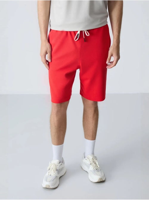 Pantalón corto de felpa para hombre de mezcla de algodón tommy - Kiabi Pantalón corto de felpa para hombre de mezcla de algodón tommy - Kiabi