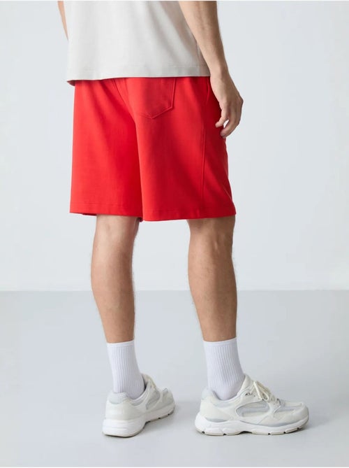 Pantalón corto de felpa para hombre de mezcla de algodón tommy - Kiabi Pantalón corto de felpa para hombre de mezcla de algodón tommy - Kiabi