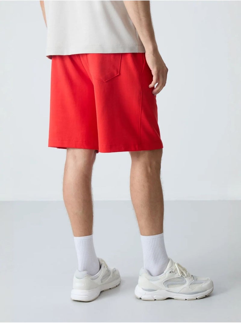 Pantalón corto de felpa para hombre de mezcla de algodón tommy Rojo - Kiabi