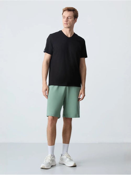 Pantalón corto de felpa para hombre de mezcla de algodón tommy - Kiabi Pantalón corto de felpa para hombre de mezcla de algodón tommy - Kiabi