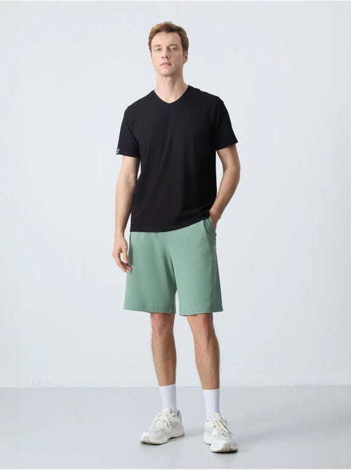 Pantalón corto de felpa para hombre de mezcla de algodón tommy - Kiabi Pantalón corto de felpa para hombre de mezcla de algodón tommy - Kiabi