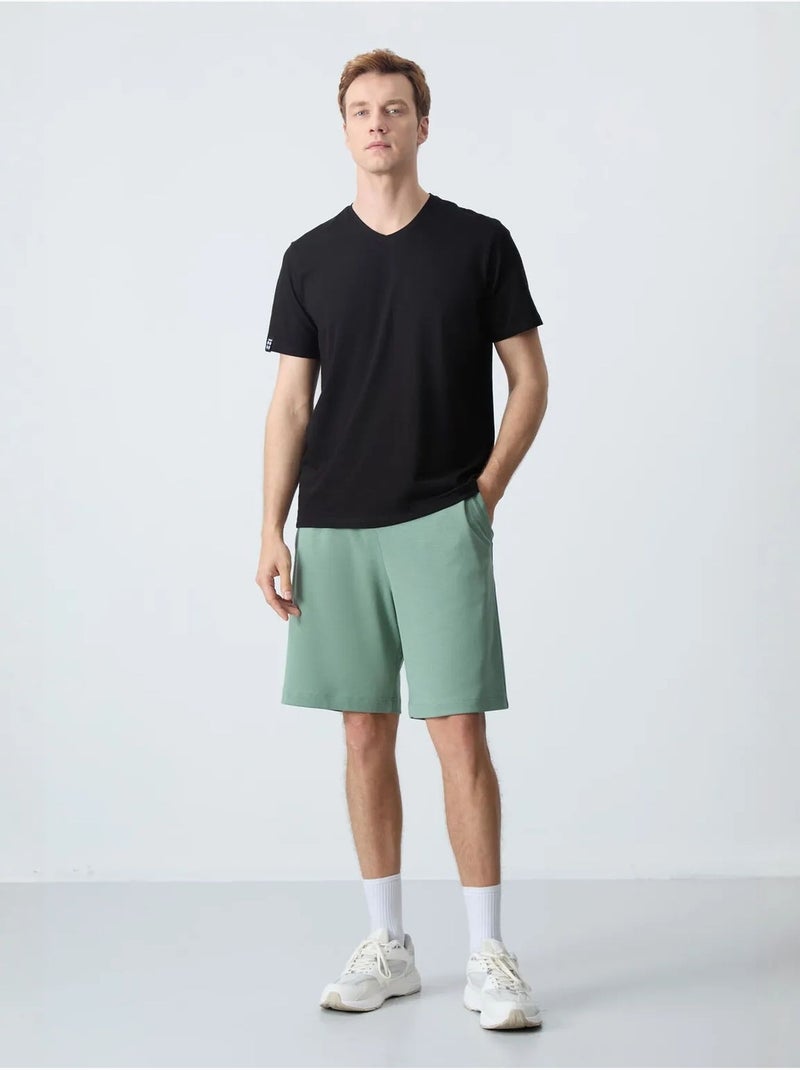 Pantalón corto de felpa para hombre de mezcla de algodón tommy Verde menta - Kiabi