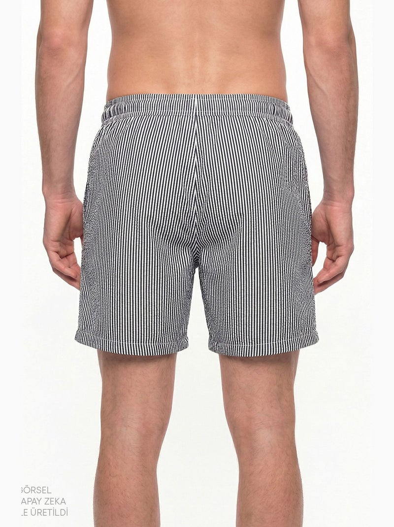 Pantalón corto de hombre con rayas tissue penti Negro Blanco - Kiabi
