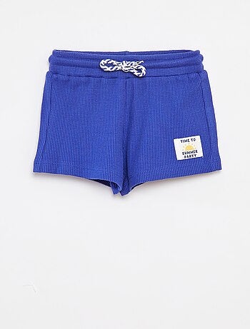 Pantalón corto de punto gofrado con estampado