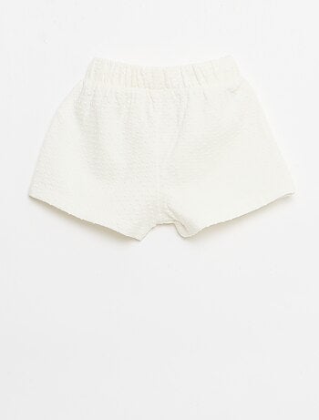 Pantalón corto de punto jacquard liso con lazo de fantasía