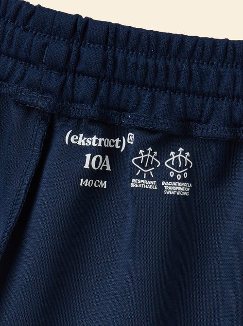 Pantalón corto deportivo con bandas contrastadas - (ekstract) - Kiabi Pantalón corto deportivo con bandas contrastadas - (ekstract) - Kiabi