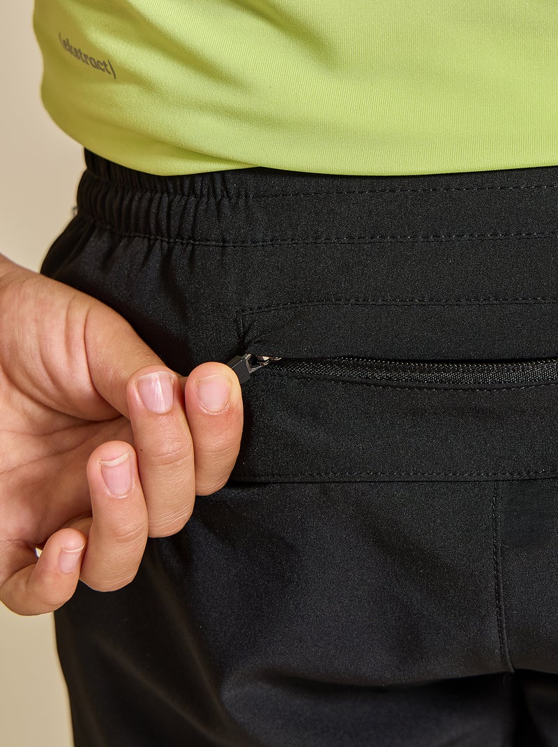 Pantalón corto deportivo con bolsillo con cremallera en la espalda - (ekstract) Negro - Kiabi