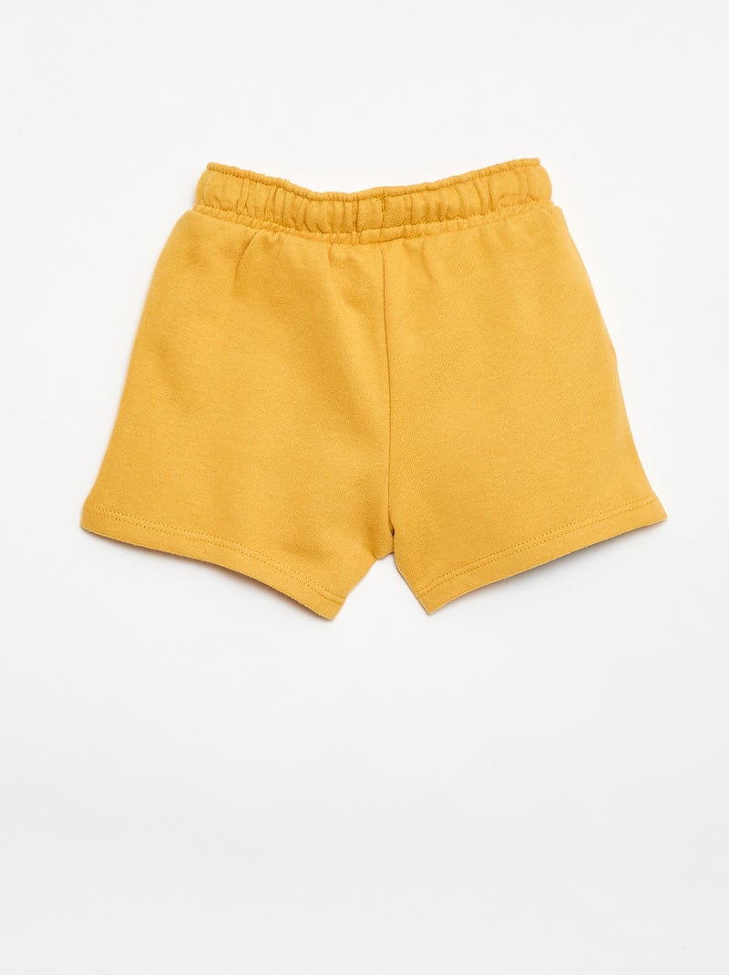 Pantalón corto 'Disney' en felpa sin cepillar Amarillo - Kiabi