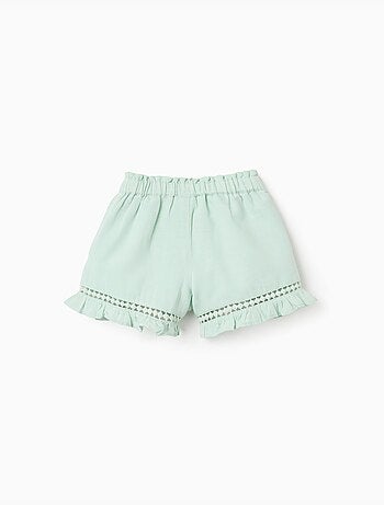 Pantalón corto en algodón y lino con dobladillo con volantes
