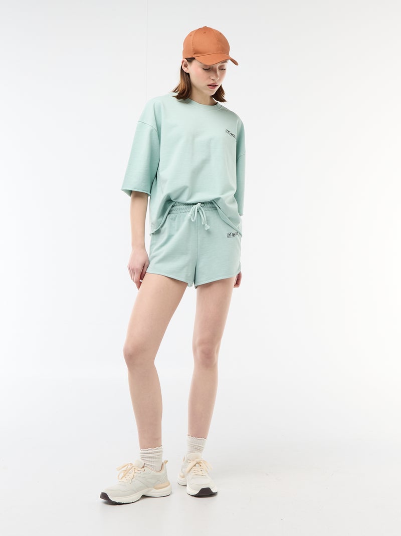 Pantalón corto en felpa con inscripción Azul - Kiabi