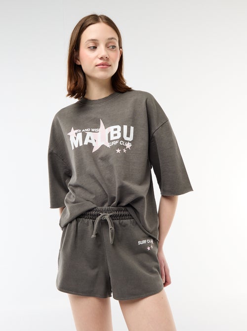 Pantalón corto en felpa con inscripción - Kiabi