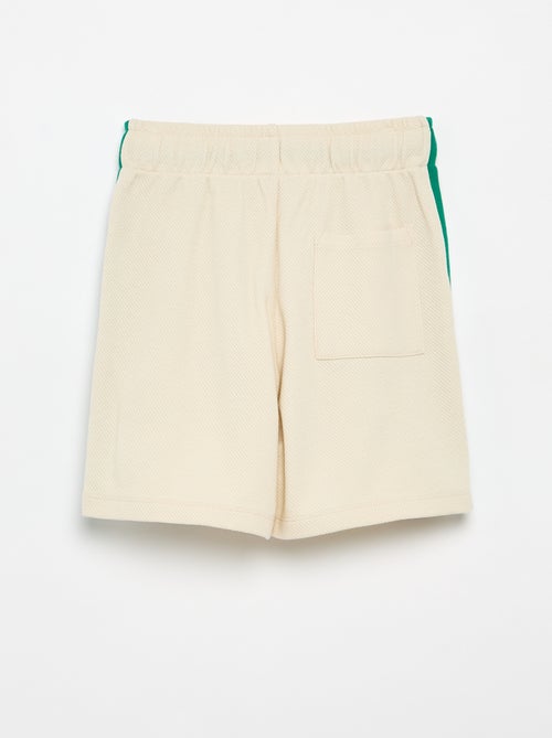 Pantalón corto holgado con líneas contrastadas en los laterales - Kiabi