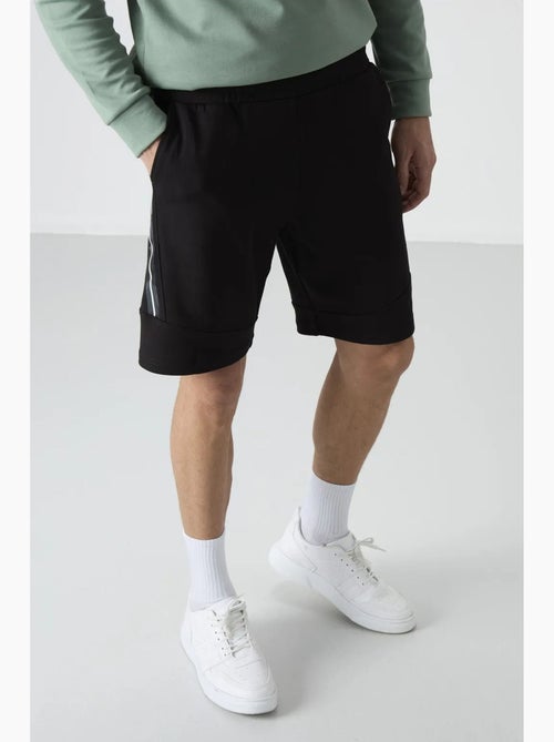 Pantalón corto jogging fácil de poner tommy - Kiabi Pantalón corto jogging fácil de poner tommy - Kiabi