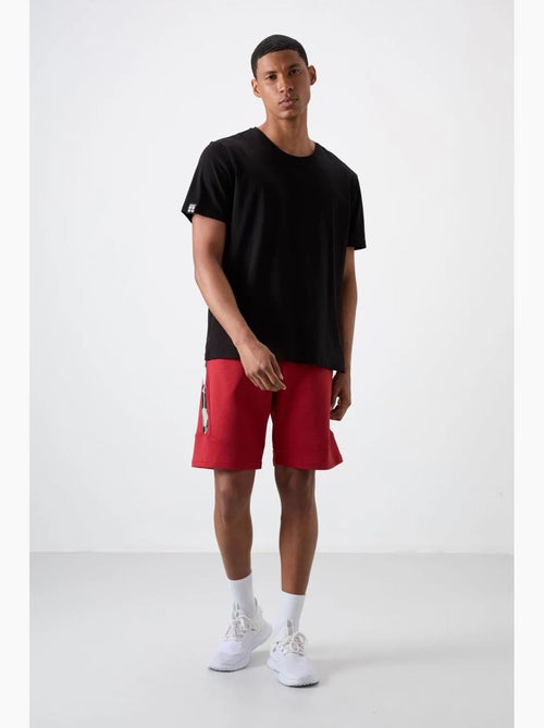 Pantalón corto jogging fácil de poner tommy - Kiabi Pantalón corto jogging fácil de poner tommy - Kiabi