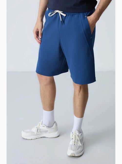 Pantalón corto jogging mezcla de algodón tommy - Kiabi Pantalón corto jogging mezcla de algodón tommy - Kiabi