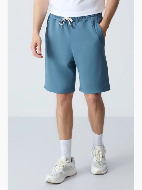 Pantalón corto jogging mezcla de algodón tommy - Kiabi Pantalón corto jogging mezcla de algodón tommy - Kiabi