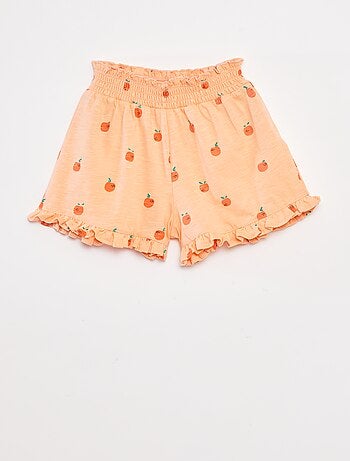 Pantalón corto ligero con estampado y volante