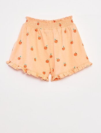 Pantalón corto ligero con estampado y volante