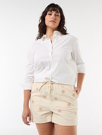 Pantalón corto sin teñir con bordados de sol