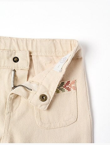 Pantalón de campana de sarga con bordado