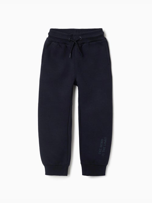Pantalón de chándal ajustado perchado con estampado - Kiabi Pantalón de chándal ajustado perchado con estampado - Kiabi