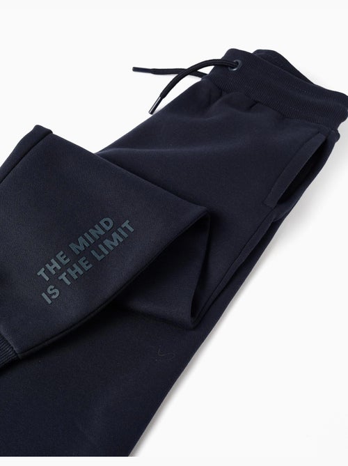 Pantalón de chándal ajustado perchado con estampado - Kiabi Pantalón de chándal ajustado perchado con estampado - Kiabi