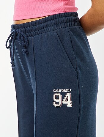 Pantalón de chándal ancho con estampado deportivo