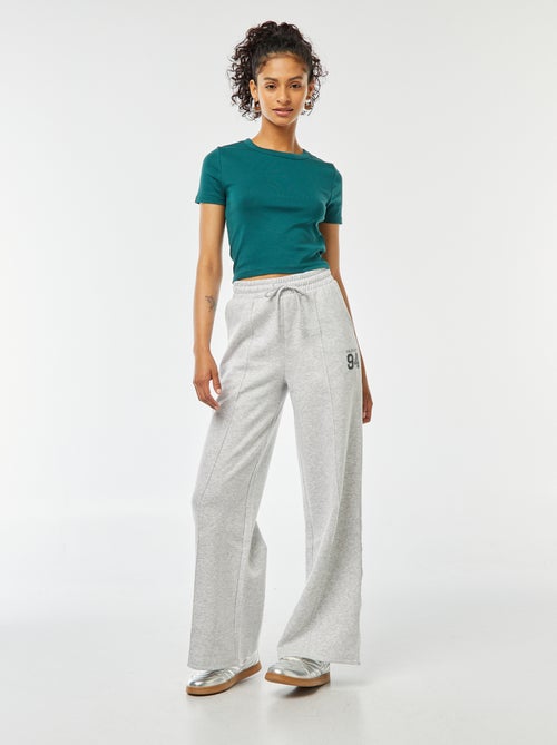Pantalón de chándal ancho con estampado deportivo - Kiabi
