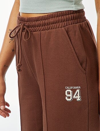 Pantalón de chándal ancho con estampado deportivo