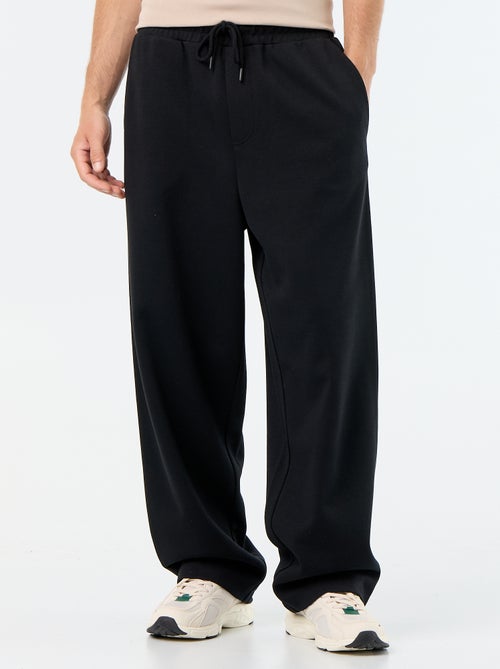 Pantalón de chándal ancho de felpa ligera - Kiabi Pantalón de chándal ancho de felpa ligera - Kiabi
