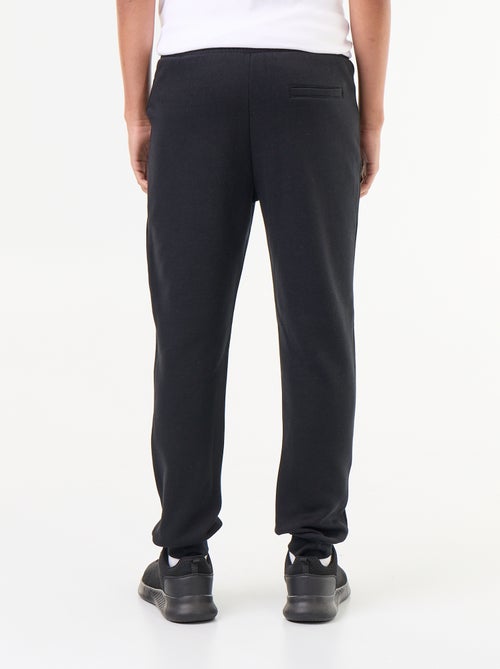 Pantalón de chándal básico liso - Kiabi Pantalón de chándal básico liso - Kiabi