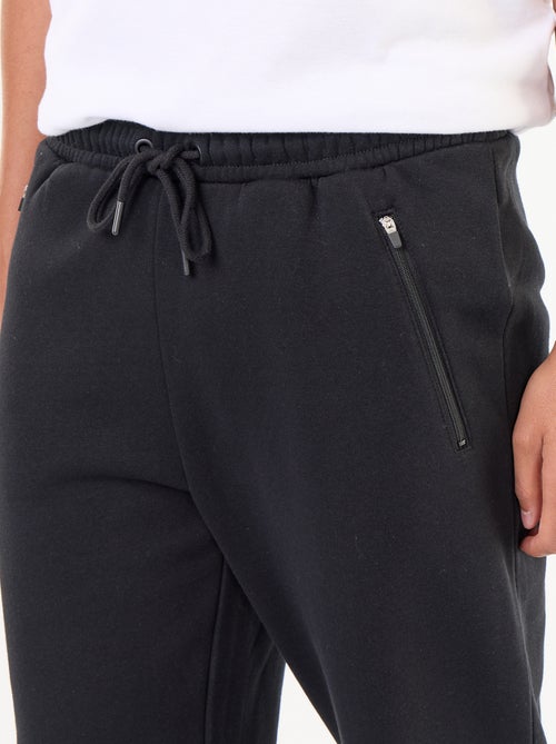 Pantalón de chándal básico liso - Kiabi Pantalón de chándal básico liso - Kiabi