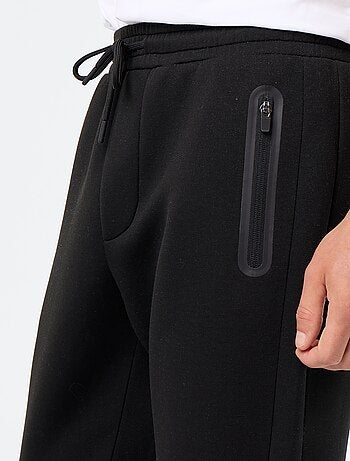 Pantalón de chándal con bolsillos con cremallera