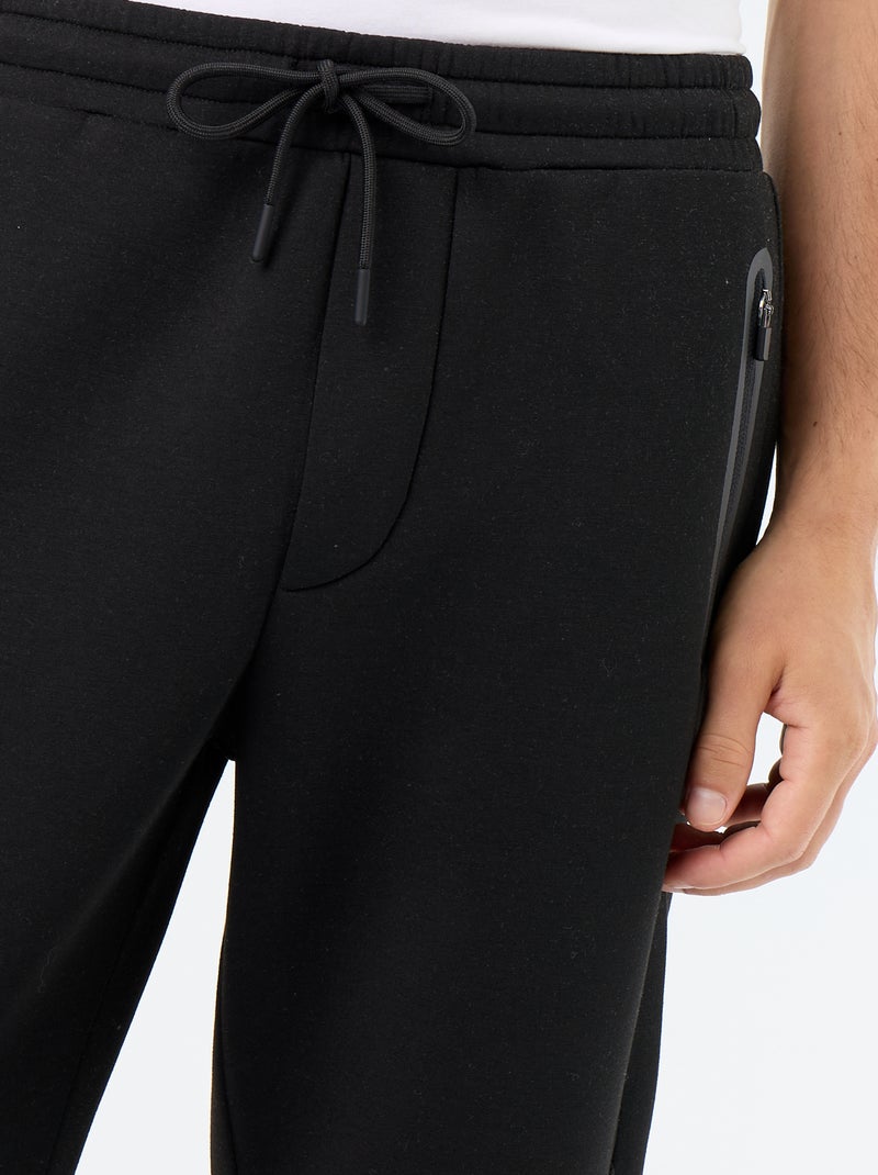 Pantalón de chándal con bolsillos con cremallera Negro - Kiabi