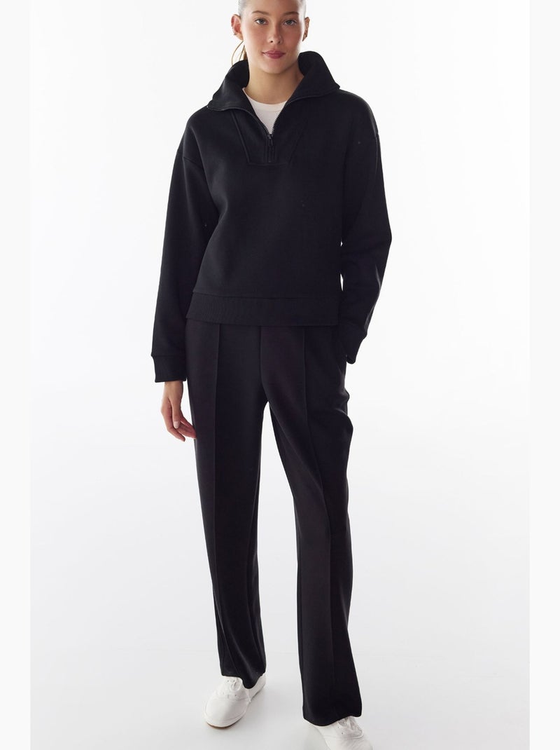 Pantalón de chándal con detalles de costura y corte globo afelpado penti Negro - Kiabi