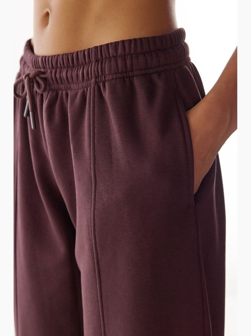 Pantalón de chándal con detalles de costura y corte globo afelpado penti - Kiabi Pantalón de chándal con detalles de costura y corte globo afelpado penti - Kiabi