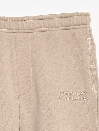 Pantalón de jogging con inscripción bordada