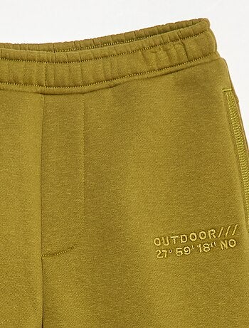 Pantalón de jogging con inscripción bordada